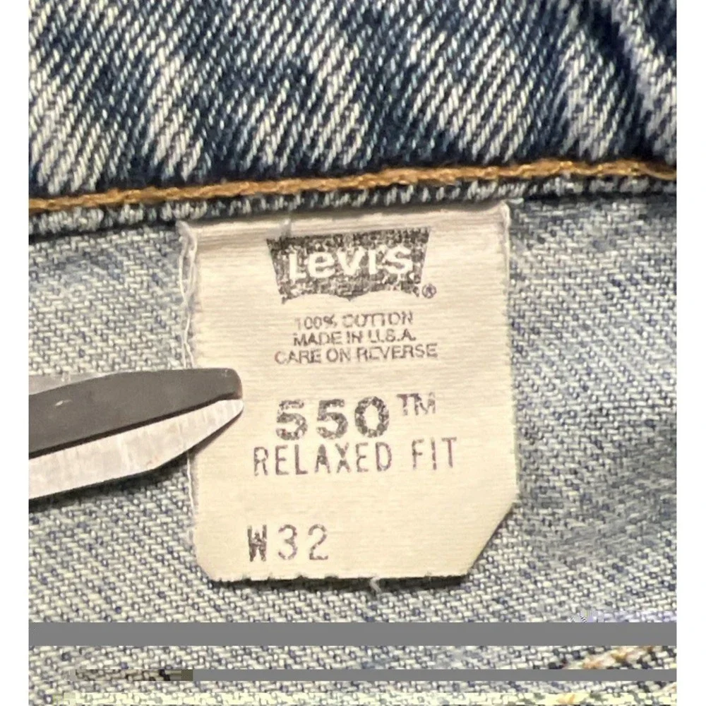 Vintage Levi's 550 Heavily Distressed Light Wash Blue Jean Shorts Size 32x10 USA